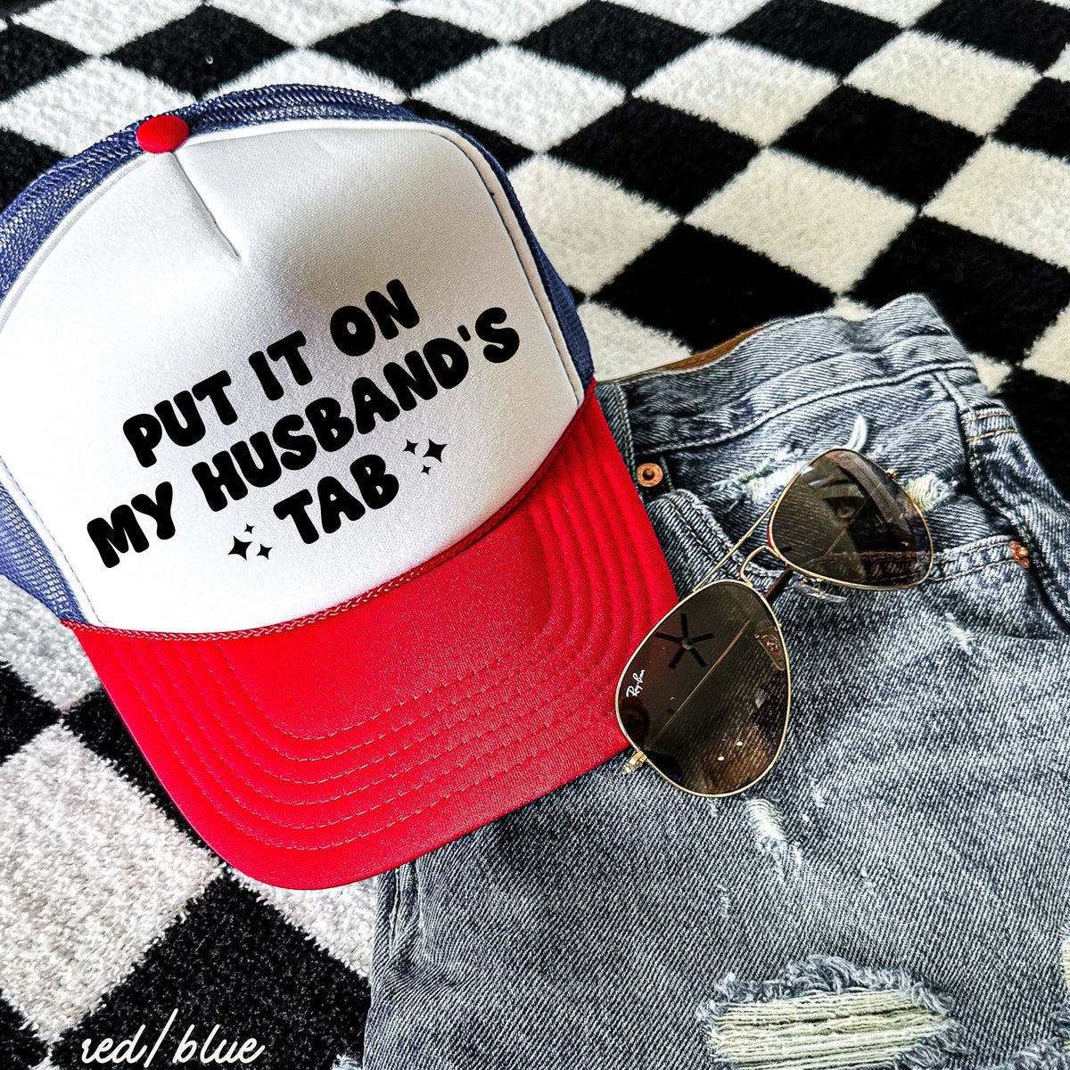 Put It On My Husband's Tab Trucker Hat *12 Colors